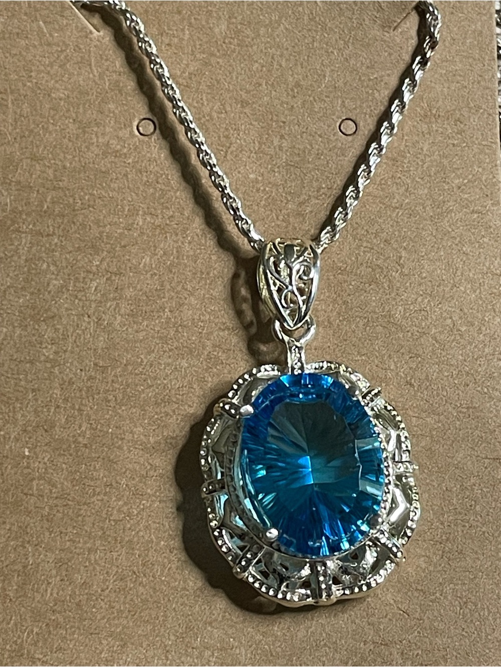 35” 925 Rope chain with silver and Blue Topaz Pendant TW. 19.8 Grams Gorgeous!